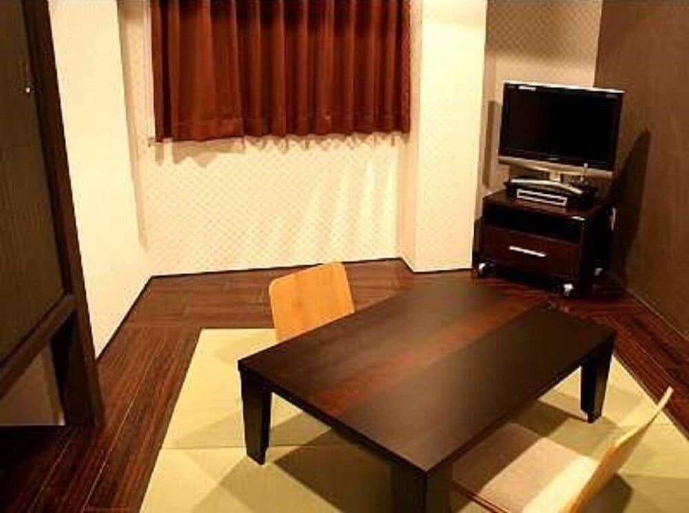 Hotel Livemax Budget Esaka Suita Esterno foto