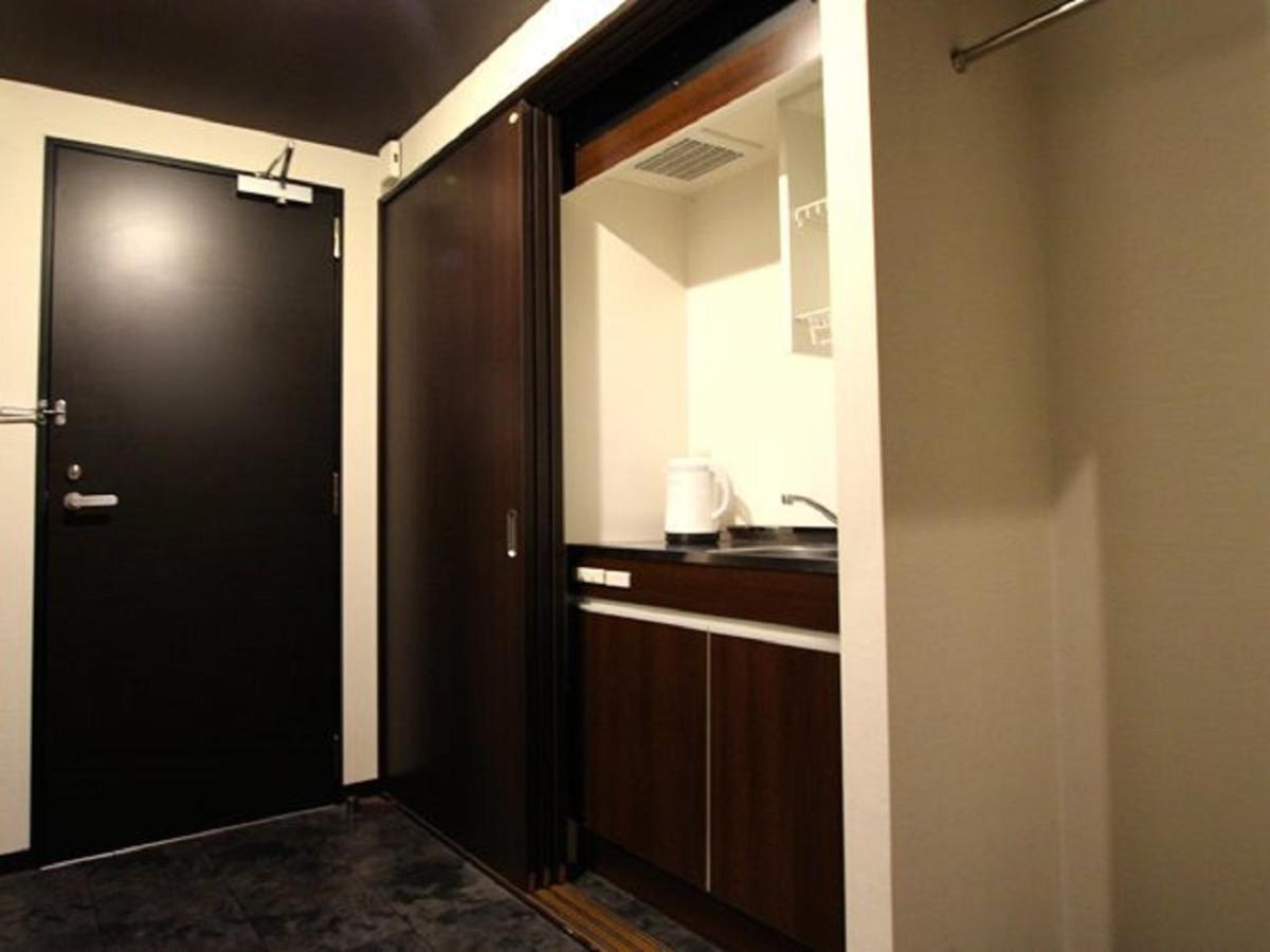 Hotel Livemax Budget Esaka Suita Esterno foto