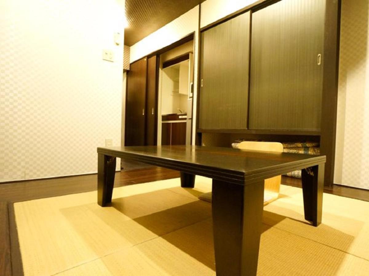 Hotel Livemax Budget Esaka Suita Esterno foto