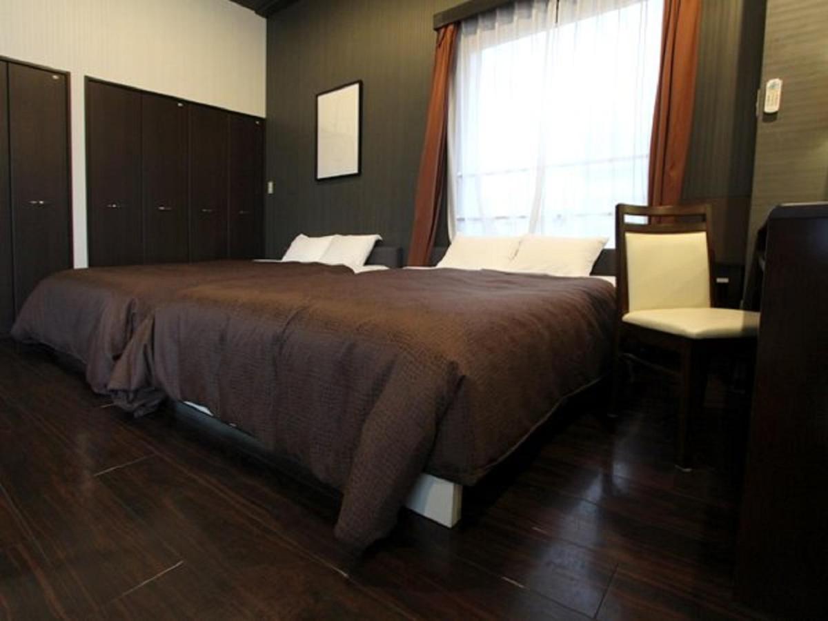 Hotel Livemax Budget Esaka Suita Esterno foto