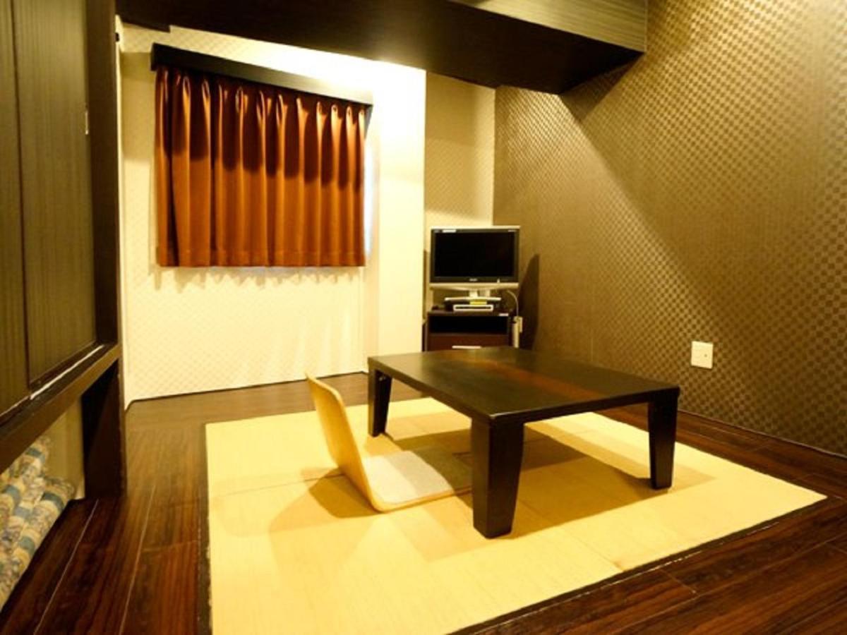 Hotel Livemax Budget Esaka Suita Esterno foto