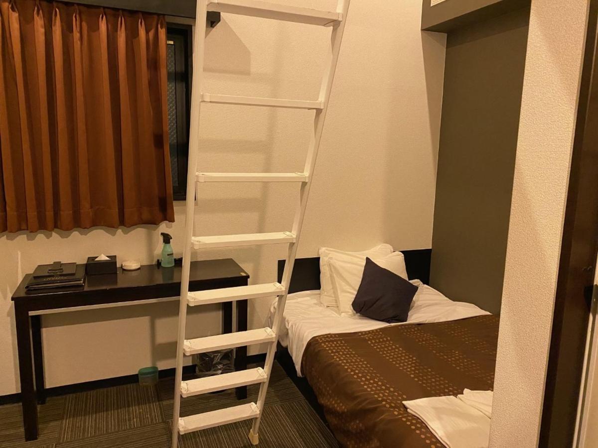 Hotel Livemax Budget Esaka Suita Esterno foto
