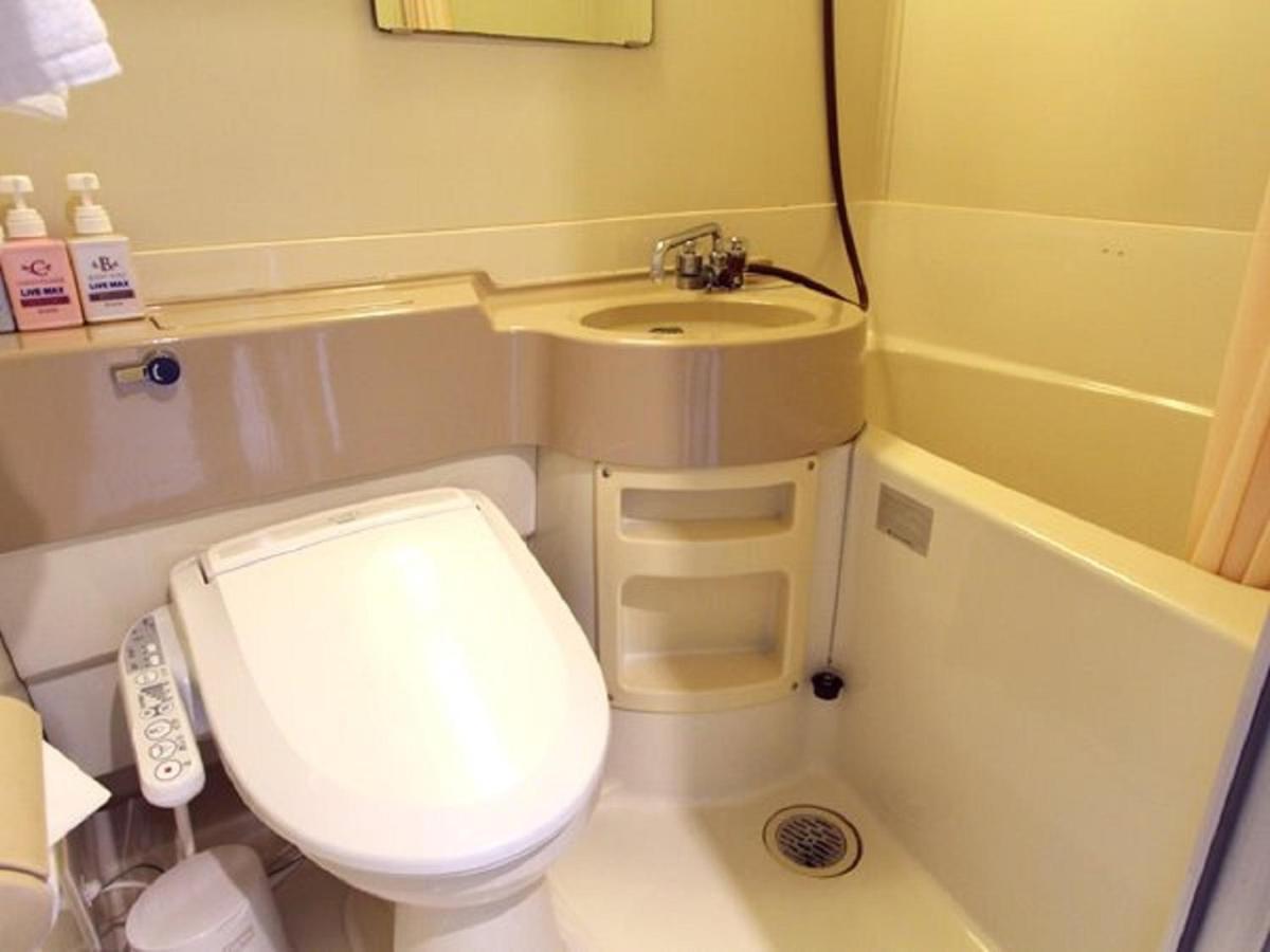 Hotel Livemax Budget Esaka Suita Esterno foto