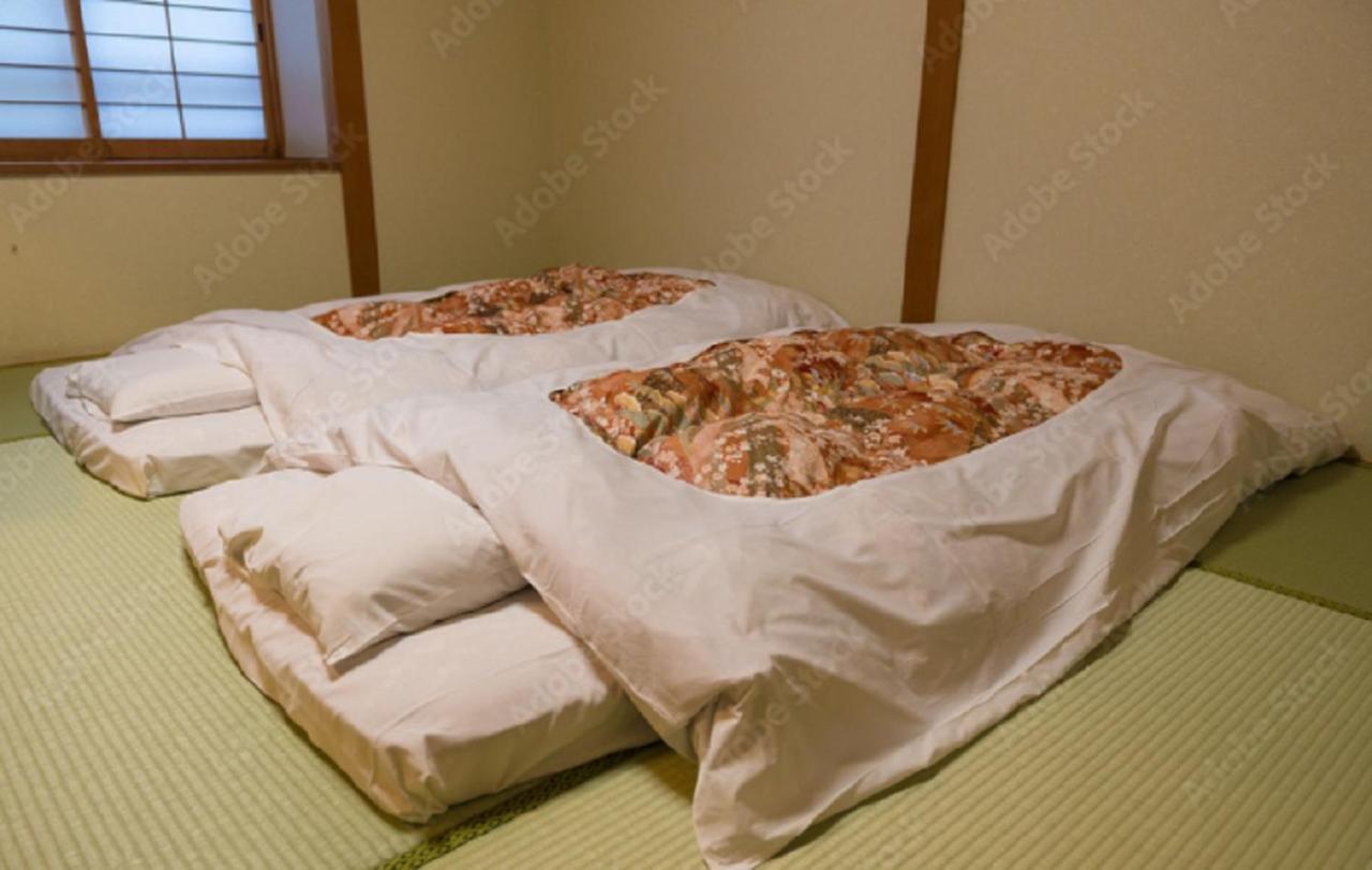Hotel Livemax Budget Esaka Suita Esterno foto