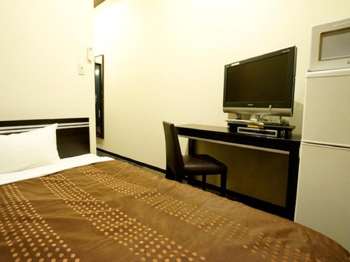 Hotel Livemax Budget Esaka Suita Esterno foto