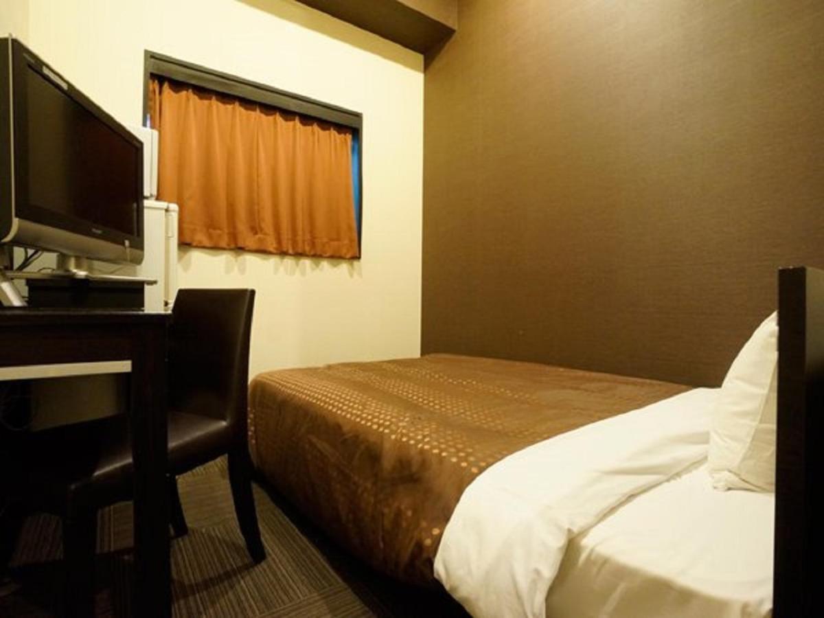 Hotel Livemax Budget Esaka Suita Esterno foto