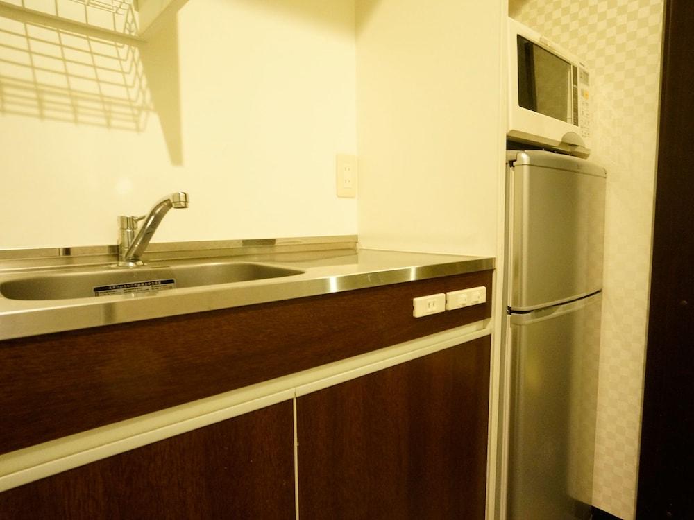 Hotel Livemax Budget Esaka Suita Esterno foto