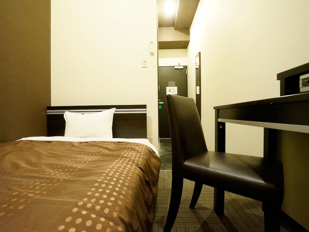 Hotel Livemax Budget Esaka Suita Esterno foto