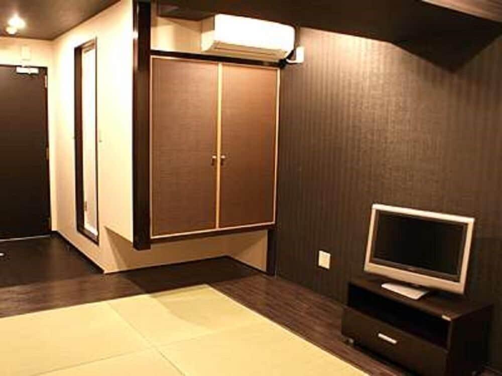 Hotel Livemax Budget Esaka Suita Esterno foto