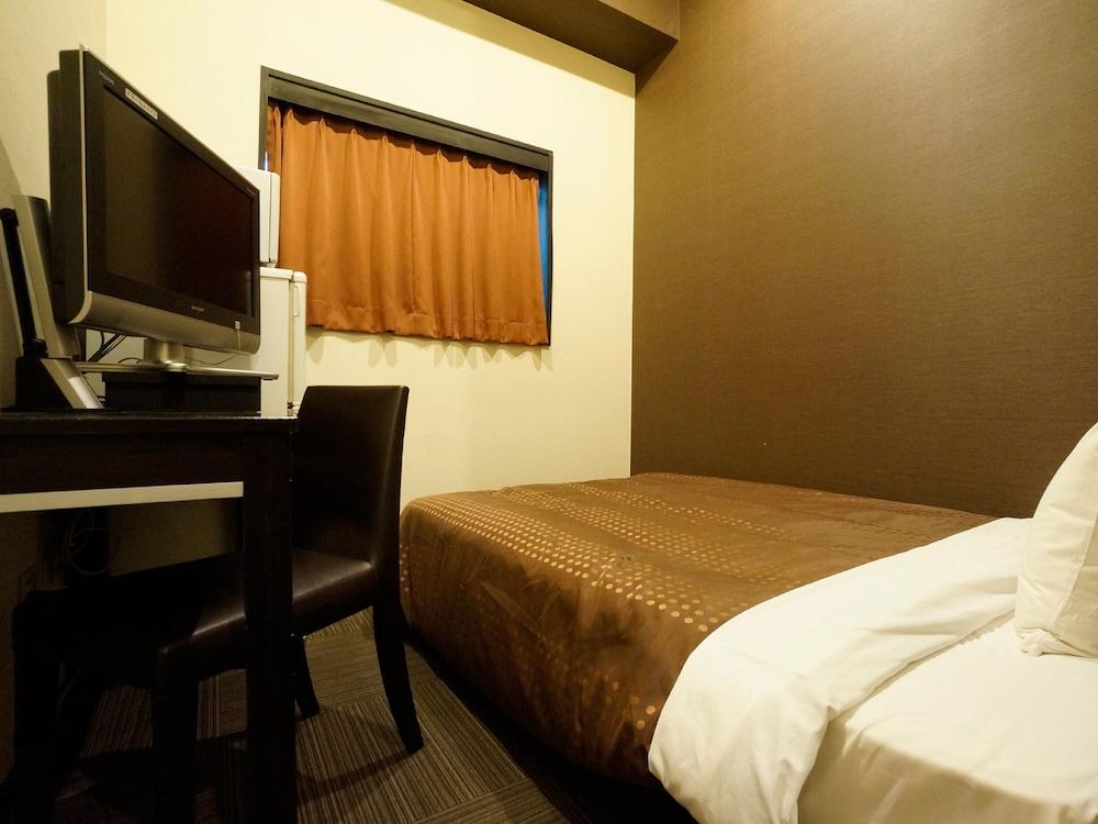 Hotel Livemax Budget Esaka Suita Esterno foto